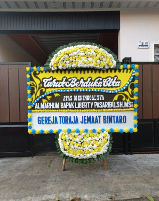 Papan Bunga Duka di Bolaang